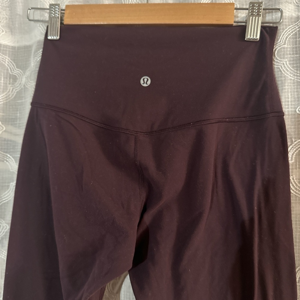Dark eggplant colored lululemon leggings